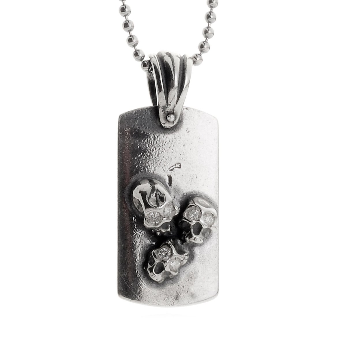 TRIO SKULL PENDANT PLATE – Pendente in argento con teschi - immagine 3